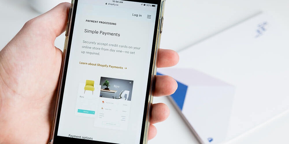 ecommerce on smartphone in hand