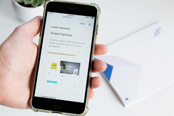 ecommerce on smartphone in hand