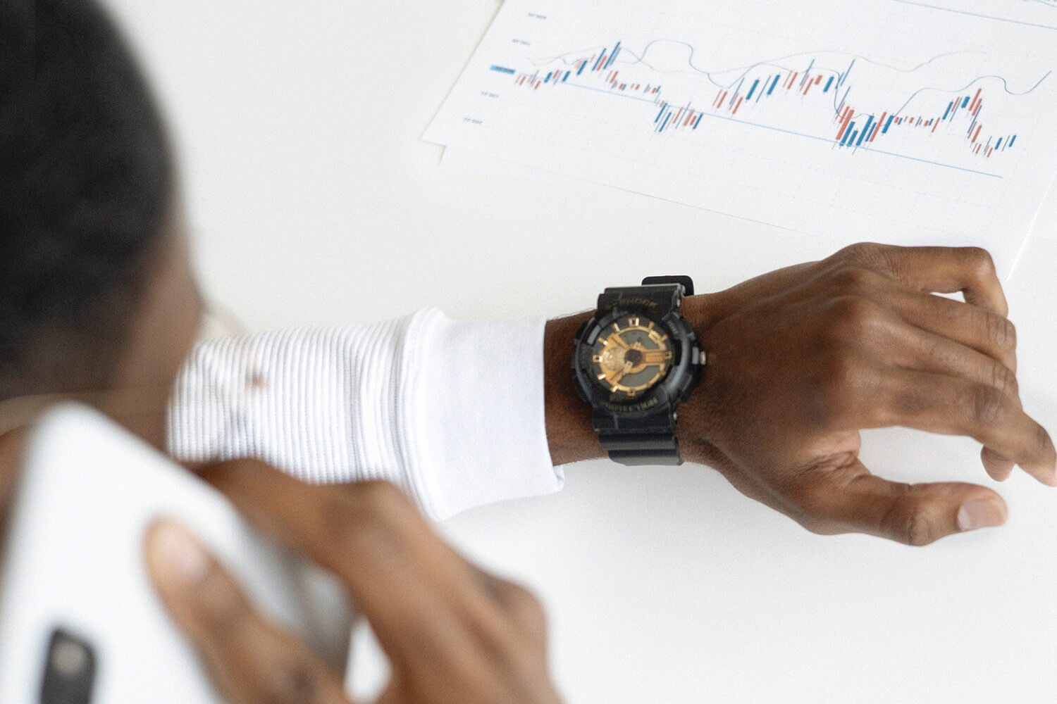 man looking at watch