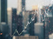 Abstract financial graph with city skyline in the background