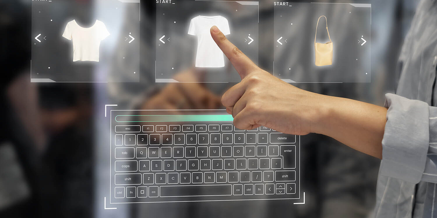 Woman using abstract digital display to select clothing items to purchase
