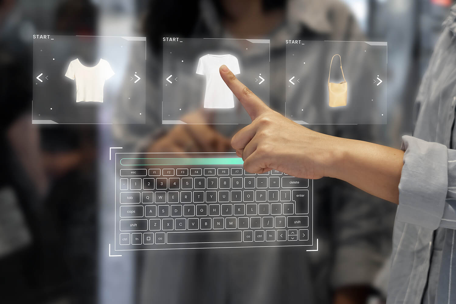 Woman using abstract digital display to select clothing items to purchase