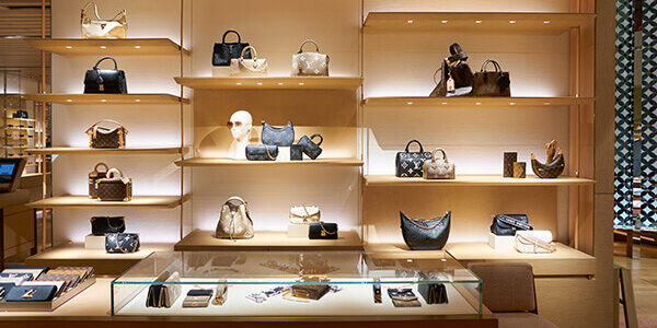 Image Credit: SINGAPORE - NOVEMBER 07, 2023: bags on display inside Louis Vuitton store in Singapore Changi Airport. Louis Vuitton is a French luxury fashion house. By Heorshe | Adobe Stock